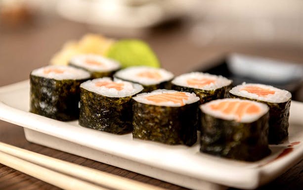 Sushi rolls on a plate at Sushi Kurusu omakase in Tokyo.