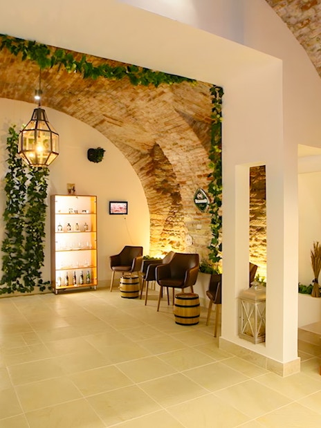 Bernard Beer Spa interior with brick arches and seating area.
