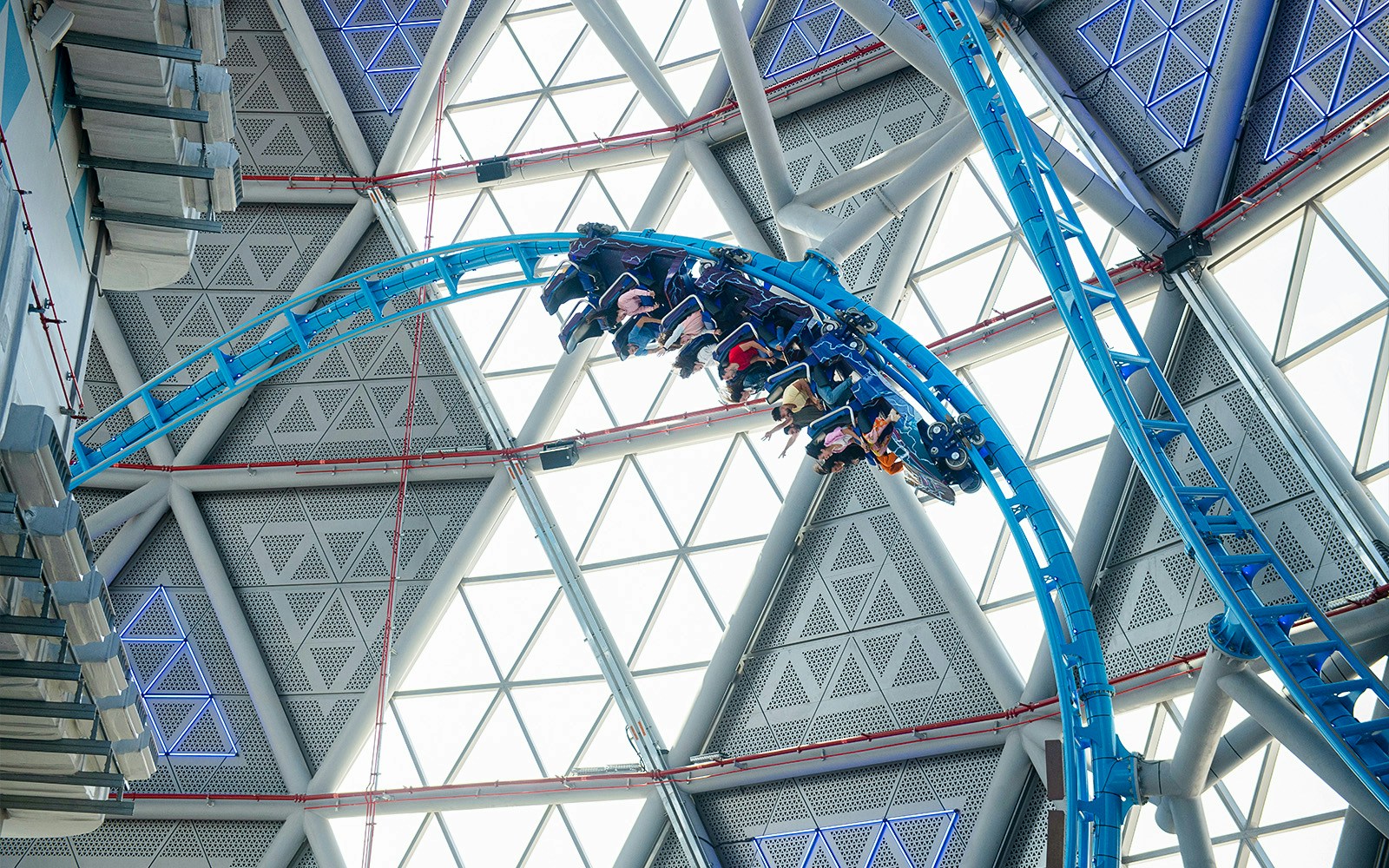 Riders on The Storm Coaster loop inside Dubai's indoor theme park.