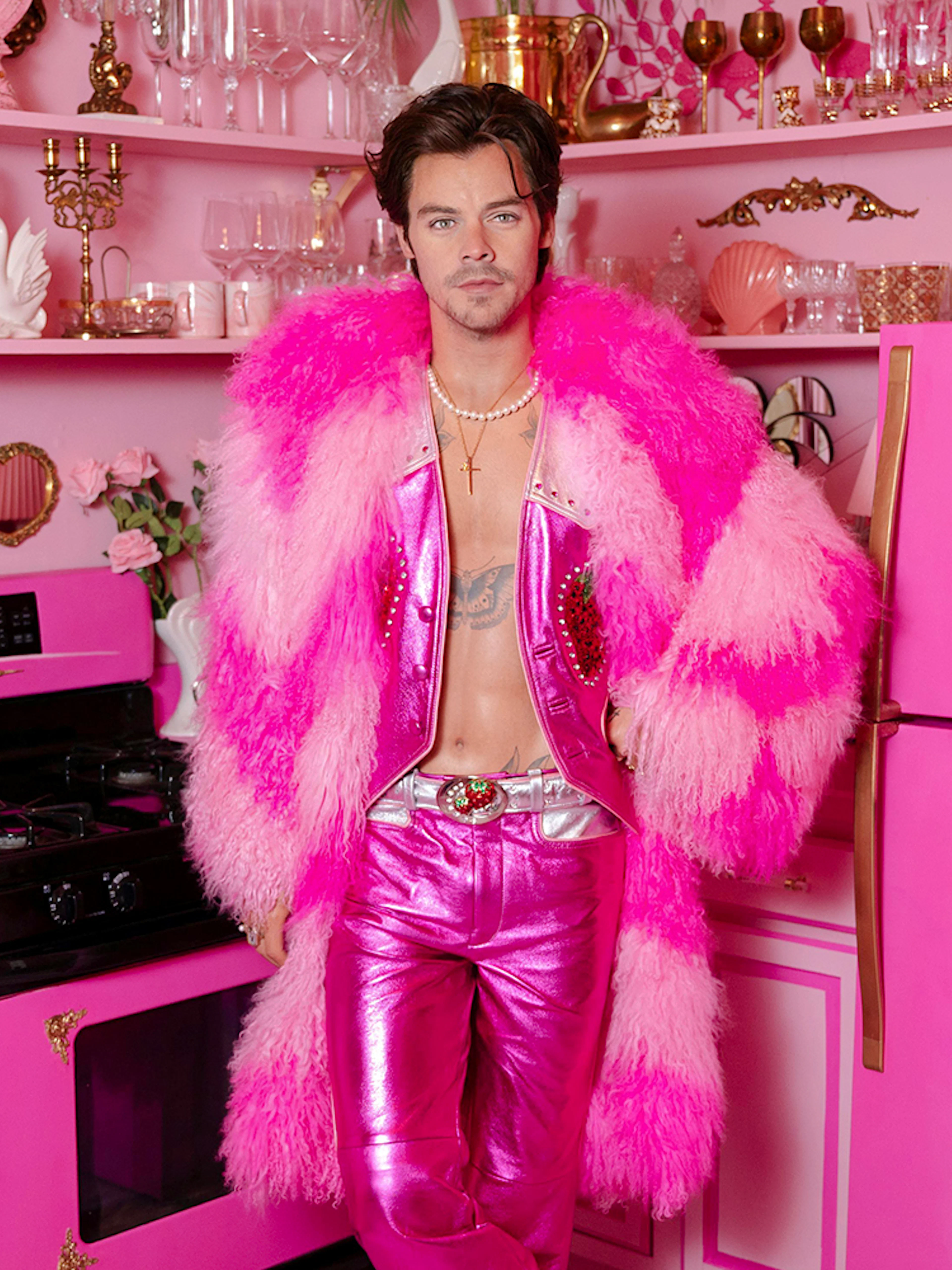 Guests exploring celebrity wax figure in pink-themed room at Madame Tussauds Nashville.