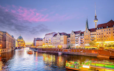 Berlin Cathedral and River Spree during evening sightseeing cruise.
