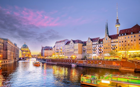Berlin Cathedral and River Spree during evening sightseeing cruise.