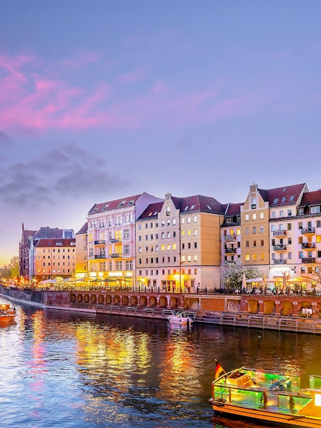 Berlin Cathedral and River Spree during evening sightseeing cruise.