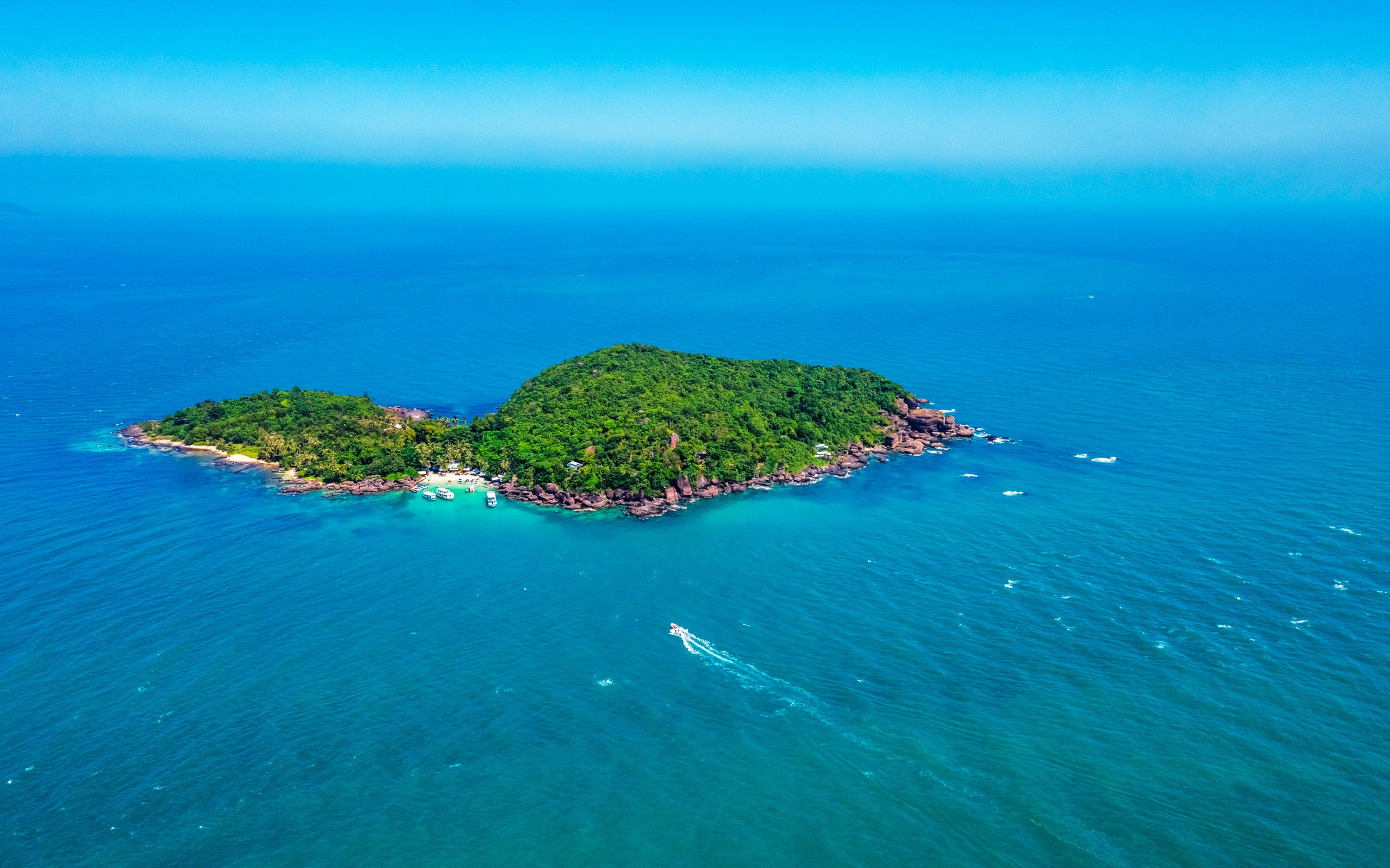 Aerial view of Xuong Island surrounded by turquoise waters in Phu Quoc, Vietnam.