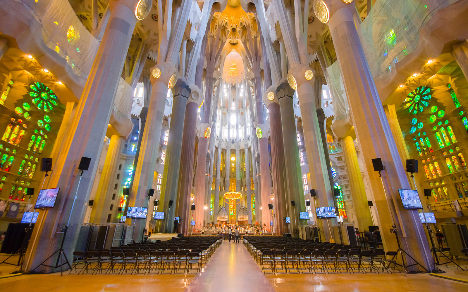 Sagrada Familia interior with stained glass windows on guided tour, Barcelona Go City Explorer Pass.