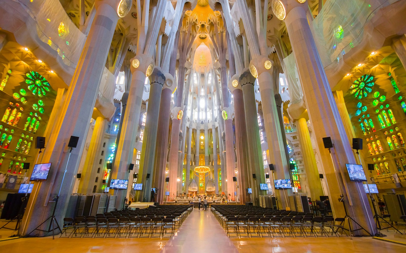 Sagrada Familia interior with stained glass windows on guided tour, Barcelona Go City Explorer Pass.