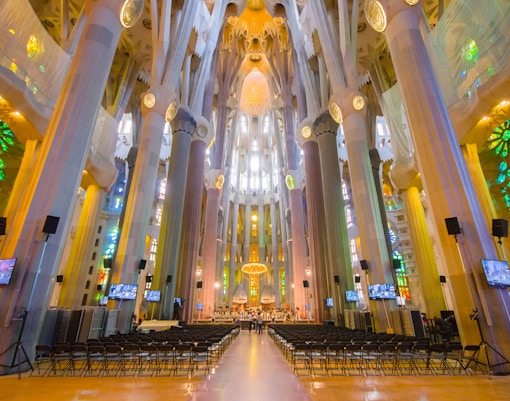 Sagrada Familia interior with stained glass windows on guided tour, Barcelona Go City Explorer Pass.
