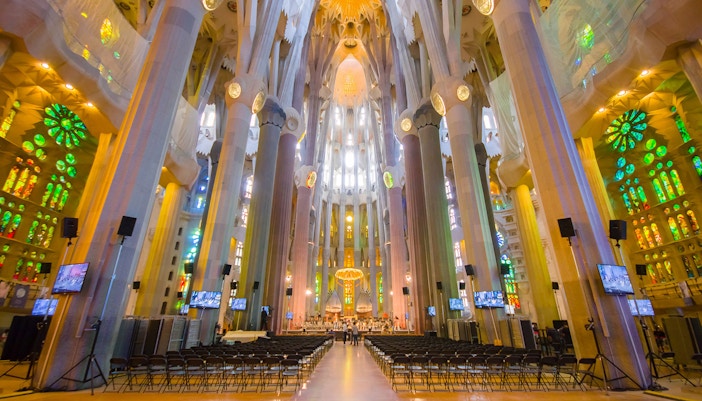 Sagrada Familia interior with stained glass windows on guided tour, Barcelona Go City Explorer Pass.
