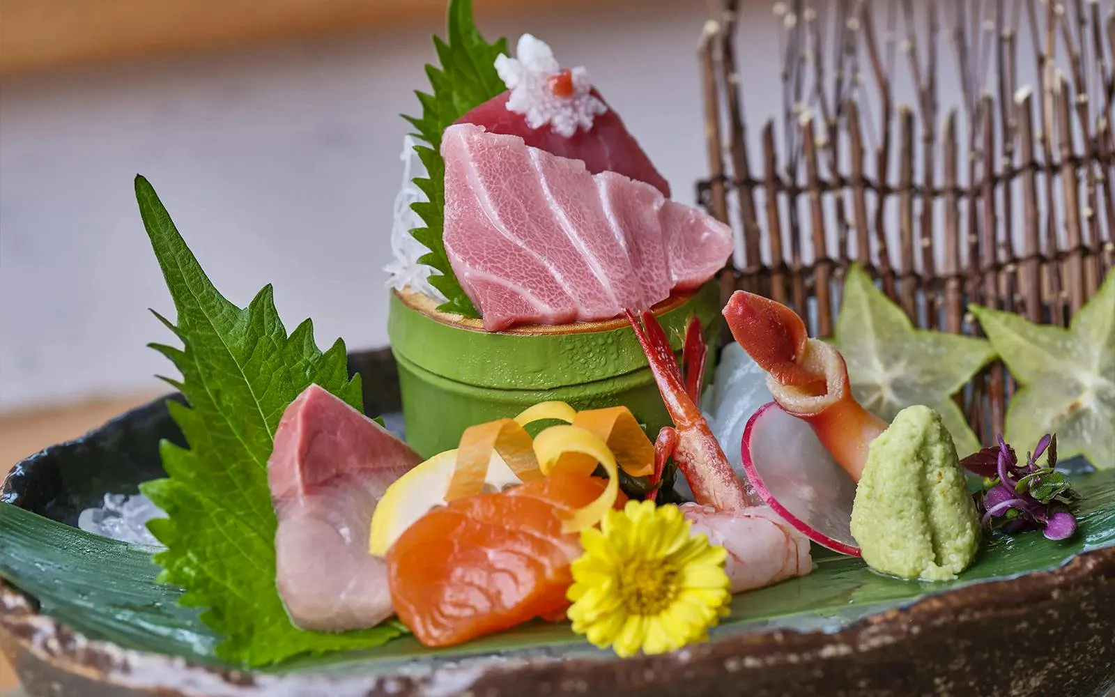 Sashimi platter with assorted seafood and garnishes on Okura Cruise Bangkok.