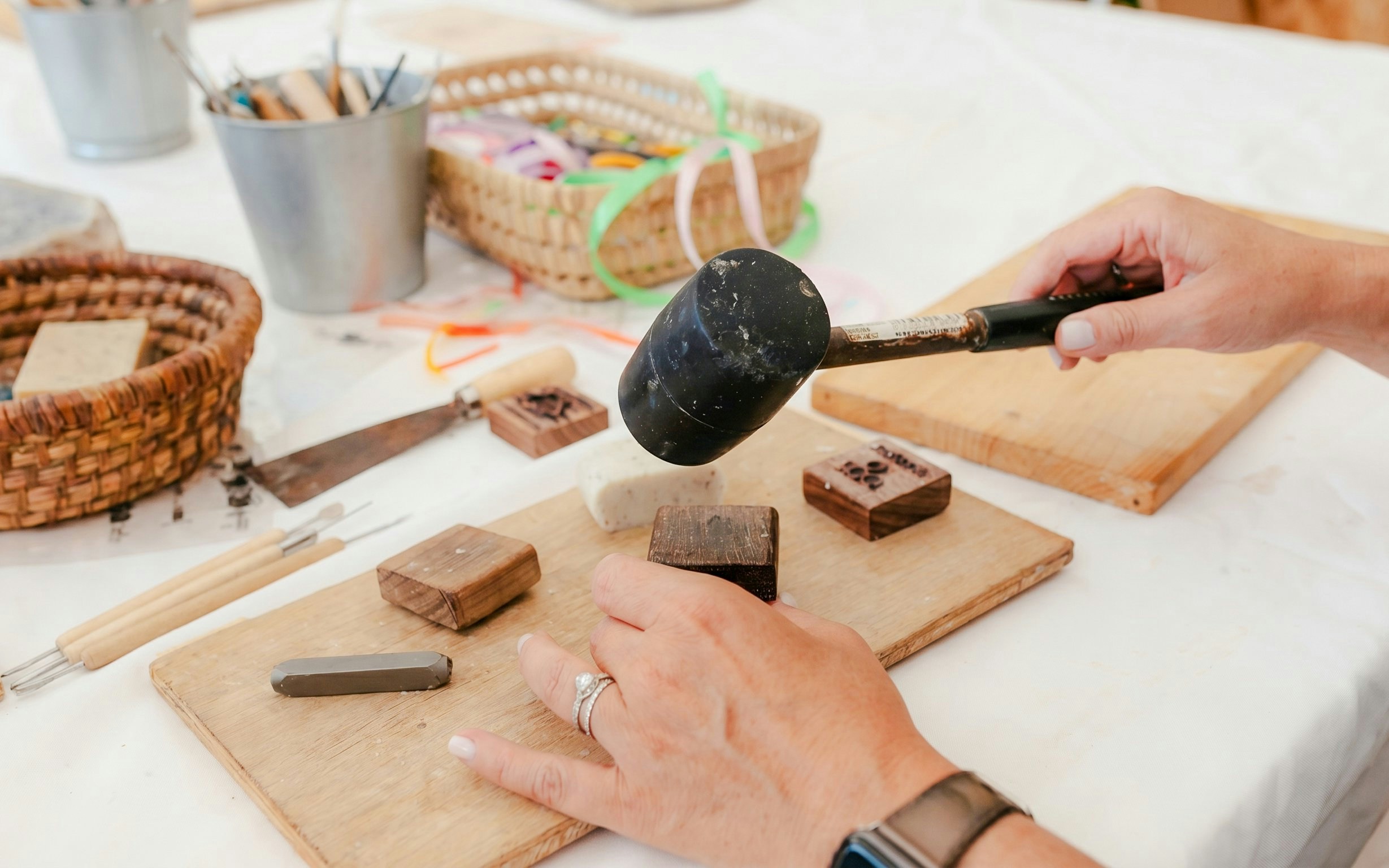 Crafting workshop with tools and stamps at Terre Ugo, Provence.