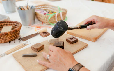 Crafting workshop with tools and stamps at Terre Ugo, Provence.