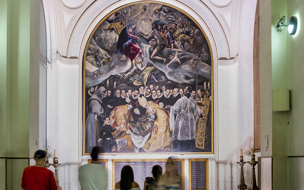 Visitors viewing El Greco's "The Burial of the Count of Orgaz" at Church of St. Tome, Toledo.