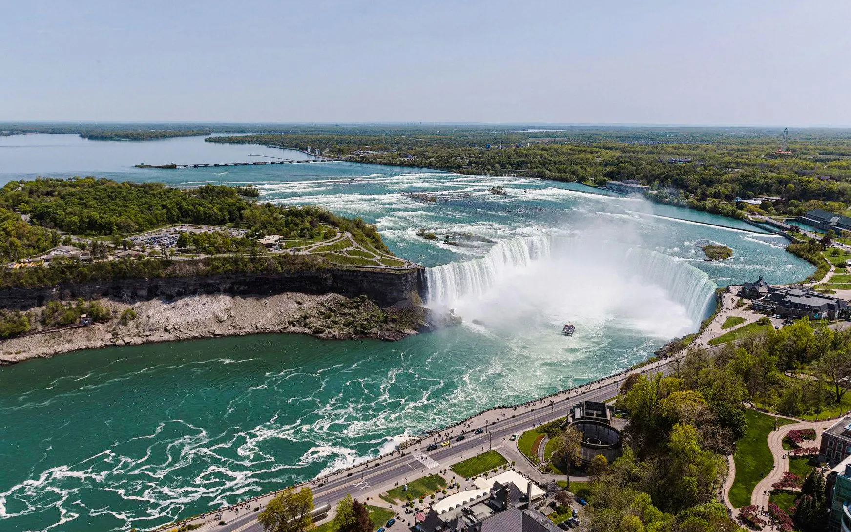 Niagara Falls view with Skylon Tower and surrounding landscape in Canada.