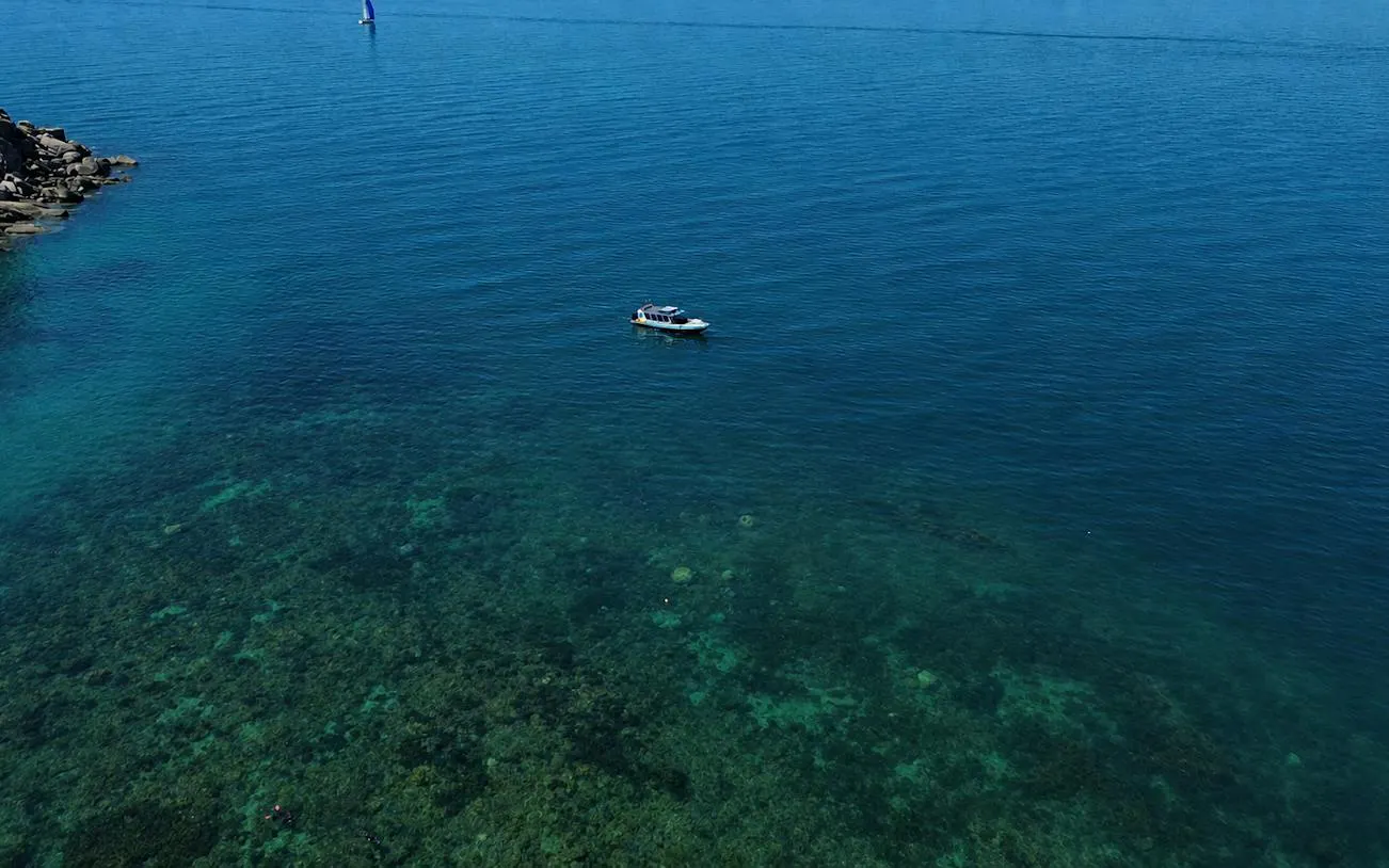 Boat on Great Barrier Reef waters near Townsville, Australia.