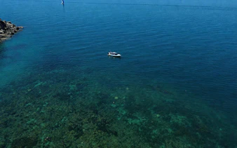 Boat on Great Barrier Reef waters near Townsville, Australia.