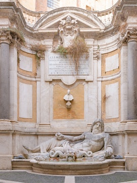 Statue of reclining river god at Roman Empire Museum, Rome.