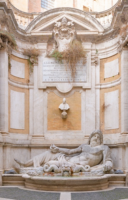 Statue of reclining river god at Roman Empire Museum, Rome.