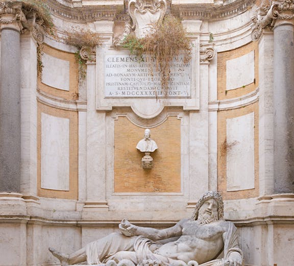 Statue of reclining river god at Roman Empire Museum, Rome.