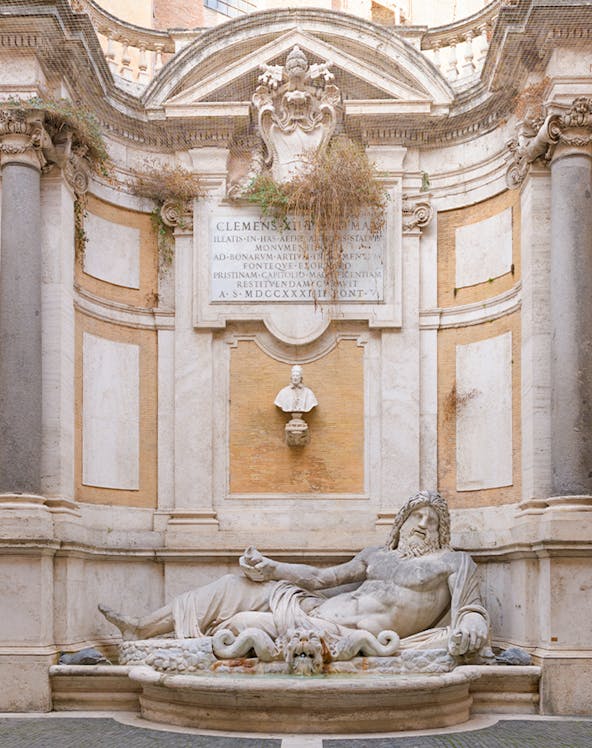 Statue of reclining river god at Roman Empire Museum, Rome.