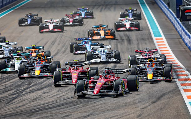 Race cars competing at the Formula 1 Miami Grand Prix.