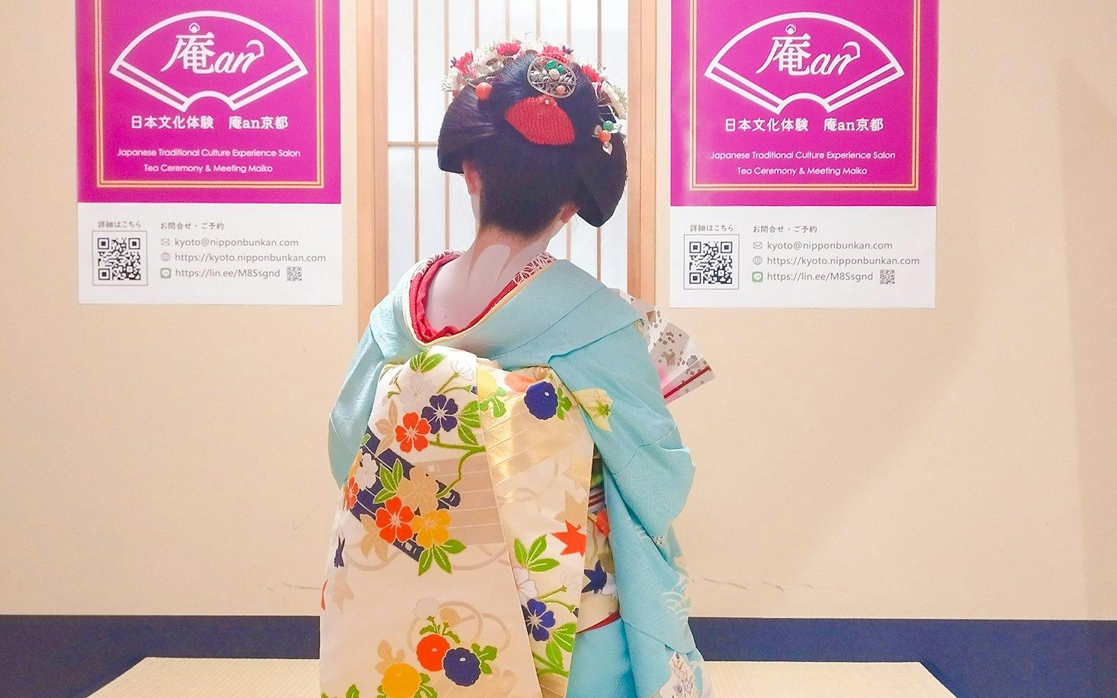 Maiko in traditional kimono at a tea ceremony in Kyoto, Japan.
