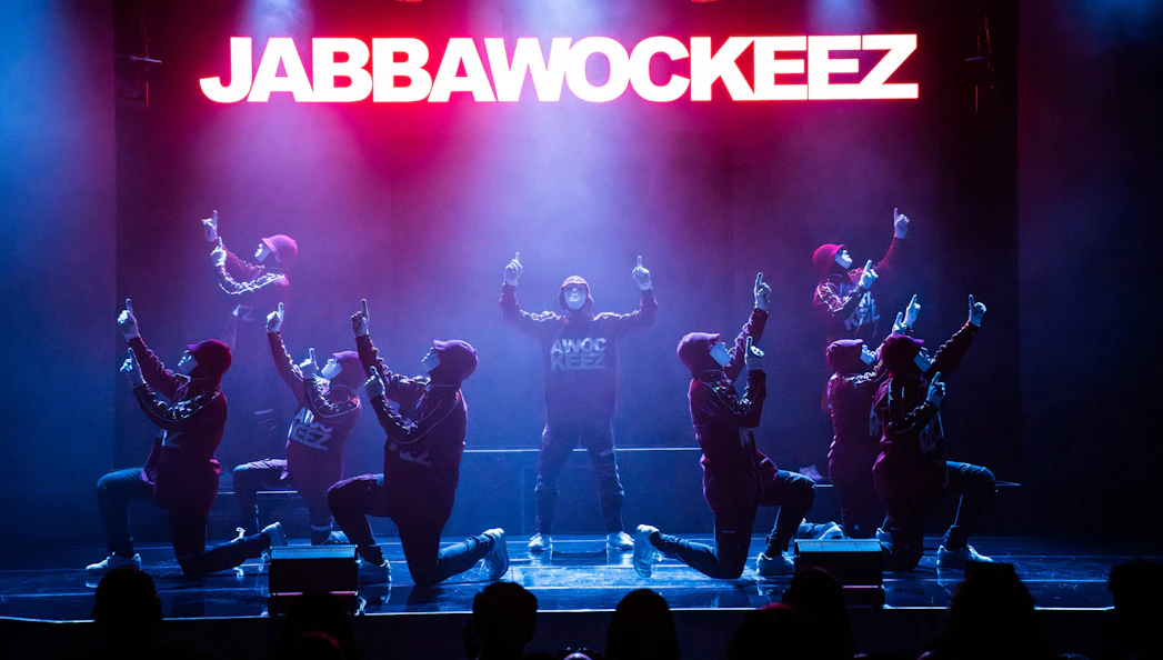 Jabbawockeez dancers performing on stage in Las Vegas show.