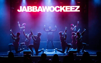 Jabbawockeez dancers performing on stage in Las Vegas show.