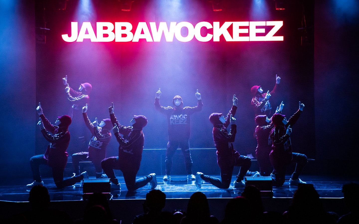 Jabbawockeez dancers performing on stage in Las Vegas show.