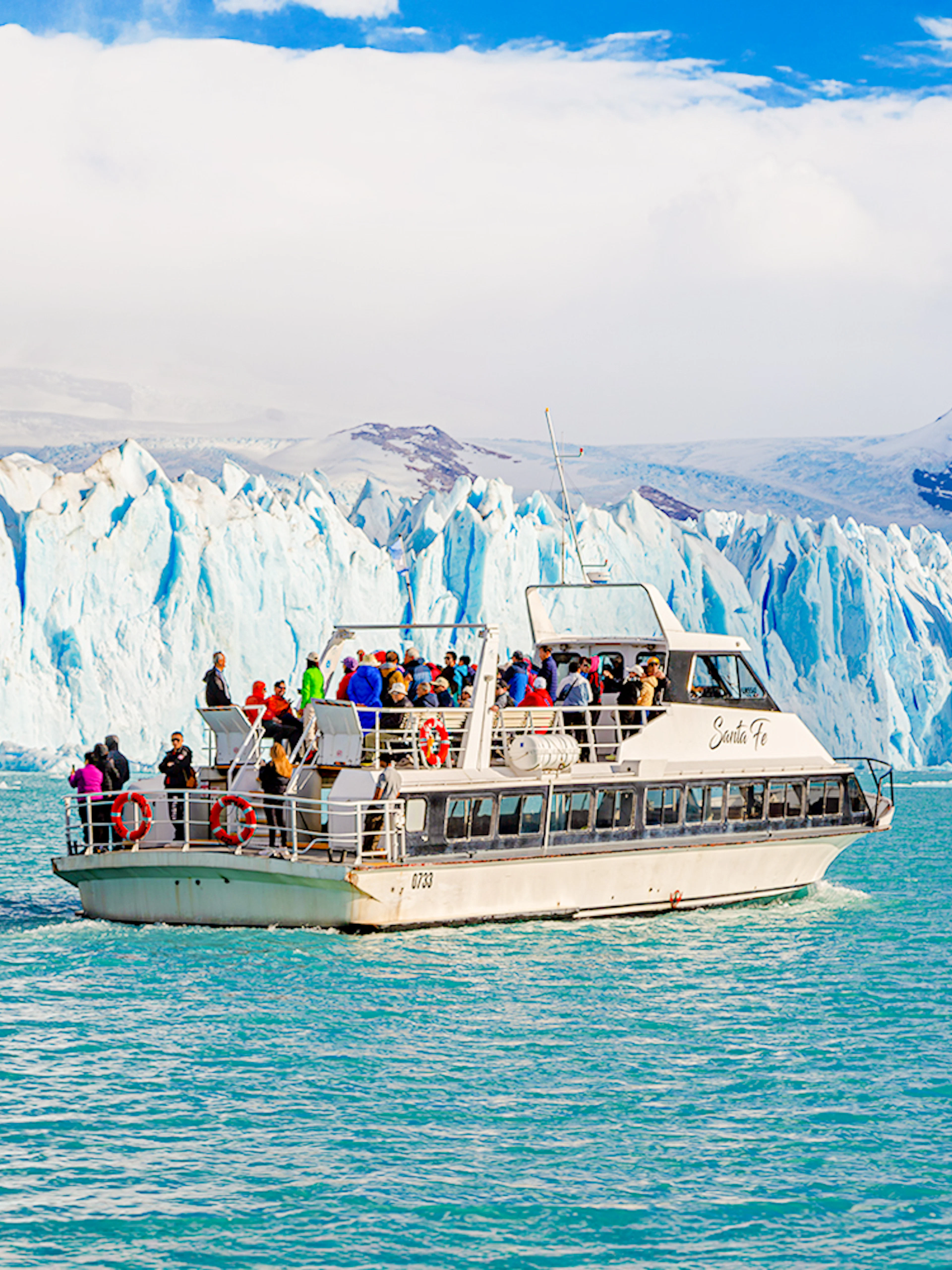 Cruise boat in front of Perito Moreno Glacier, Argentina.