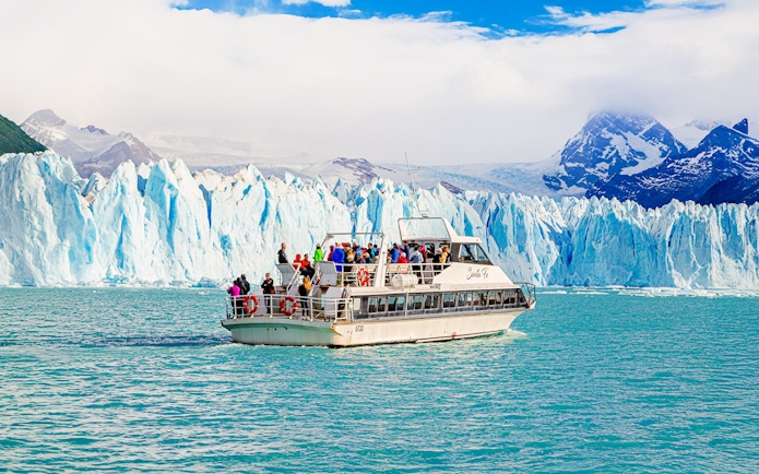 Cruise boat in front of Perito Moreno Glacier, Argentina.