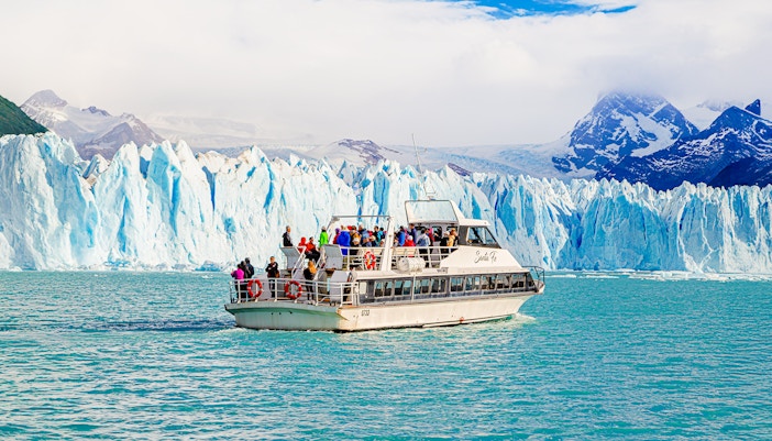 Cruise boat in front of Perito Moreno Glacier, Argentina.