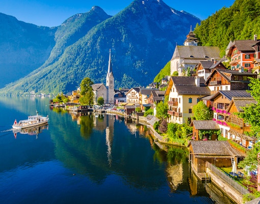 Hallstatt village by the lake with mountains in summer, Salzkammergut, Austria.