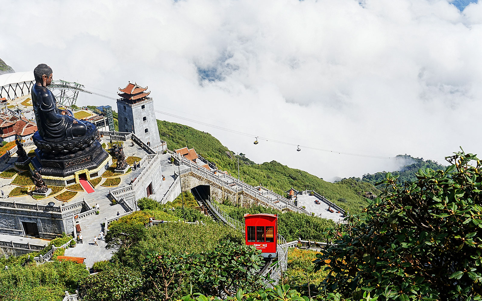 Cable car and Buddha statue at Sun World Fansipan Legend, Vietnam.