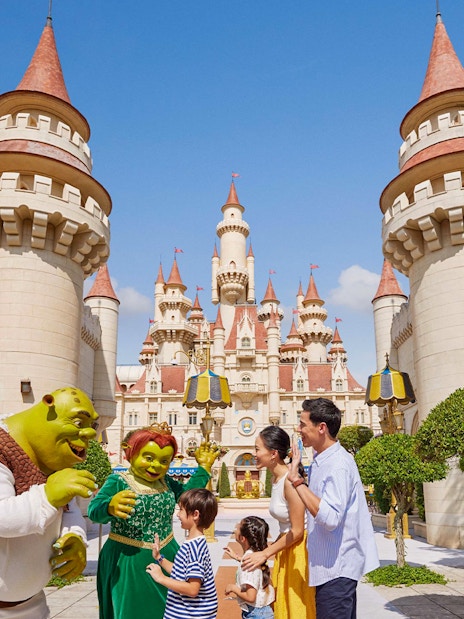 Characters from Shrek interacting with visitors at Universal Studios Singapore.