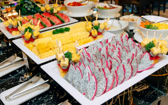Tropical fruit platter on Unicorn Dinner Cruise in Bangkok.