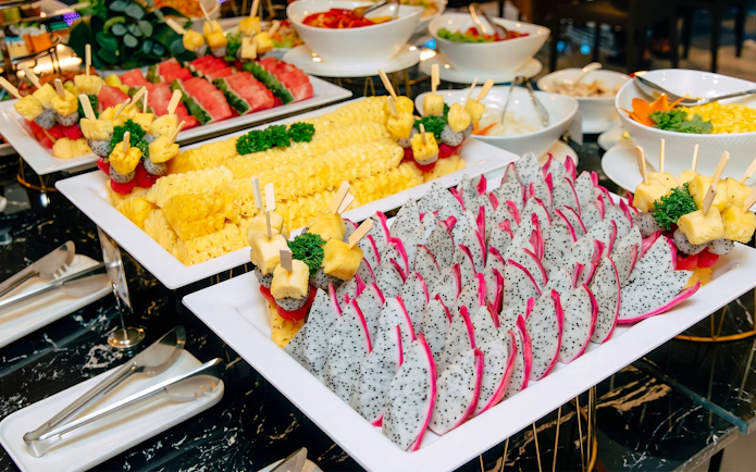 Tropical fruit platter on Unicorn Dinner Cruise in Bangkok.