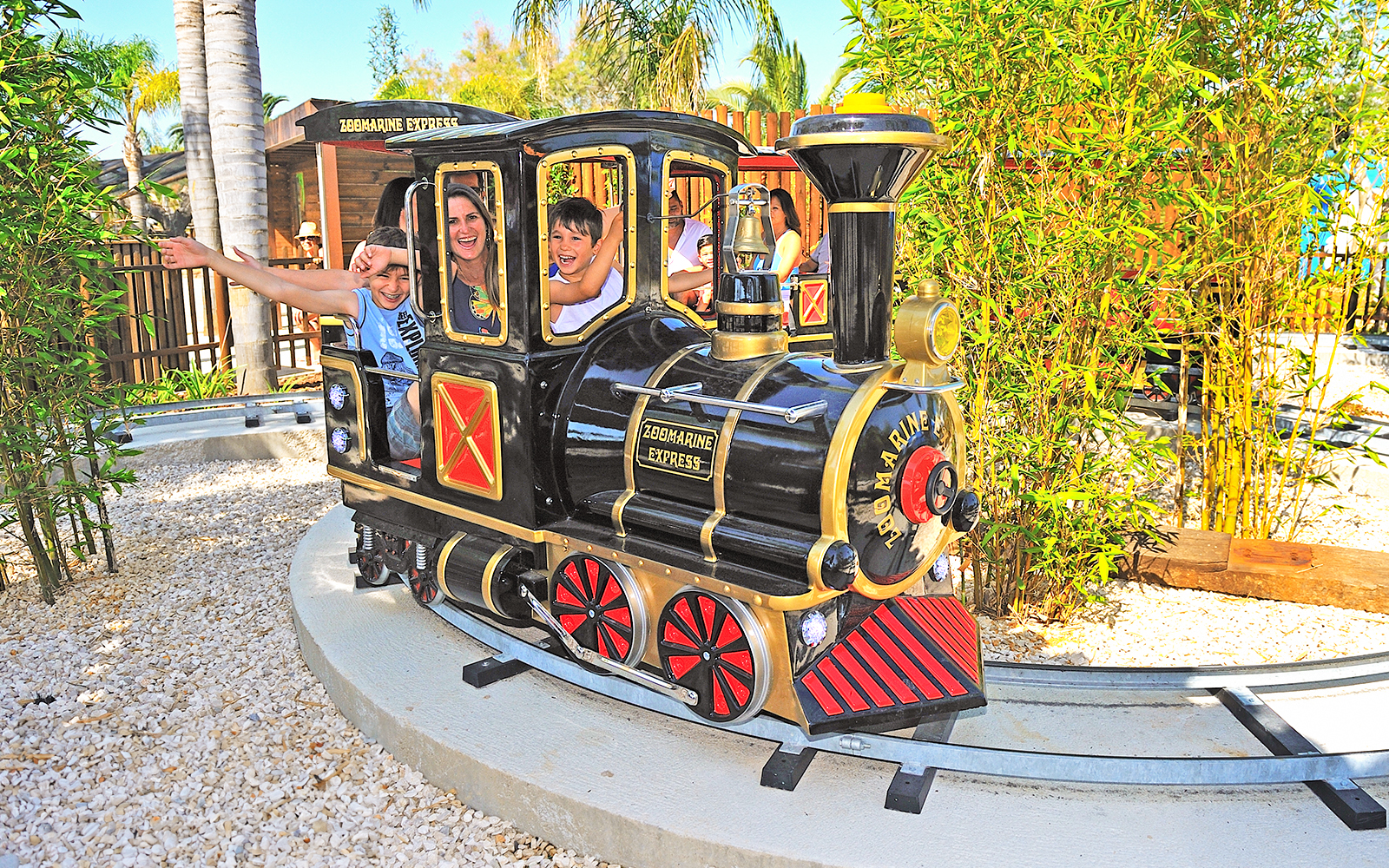Guests enjoying a ride on the Zoomarine Express roller coaster in Algarve, Portugal.