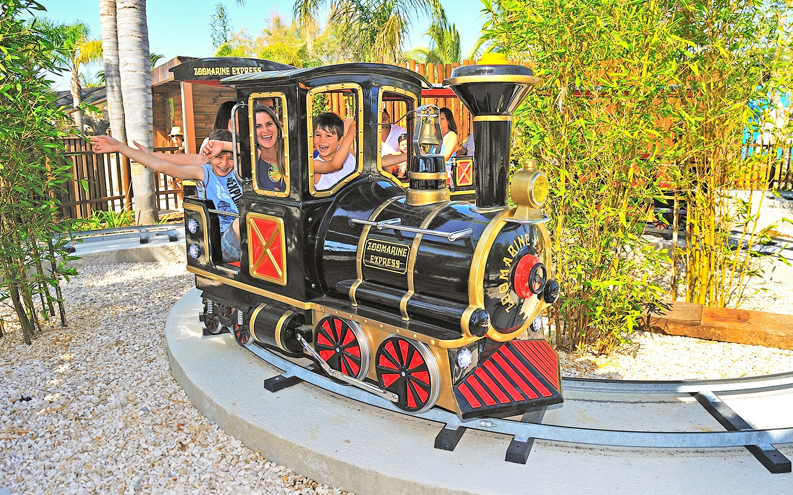 Guests enjoying a ride on the Zoomarine Express roller coaster in Algarve, Portugal.
