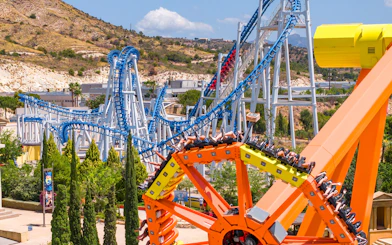 Roller coasters and thrill rides at Terra Mitica theme park in Benidorm, Spain.