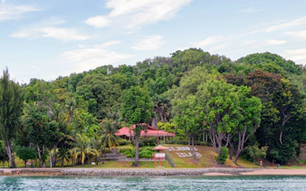 St John's Island lush greenery and shoreline, Southern Islands, Singapore.