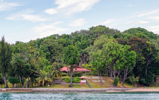 St John's Island lush greenery and shoreline, Southern Islands, Singapore.