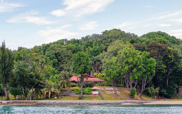 St John's Island lush greenery and shoreline, Southern Islands, Singapore.