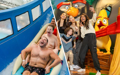Group enjoying water slide and taking selfies with Angry Birds at American Dream attractions.