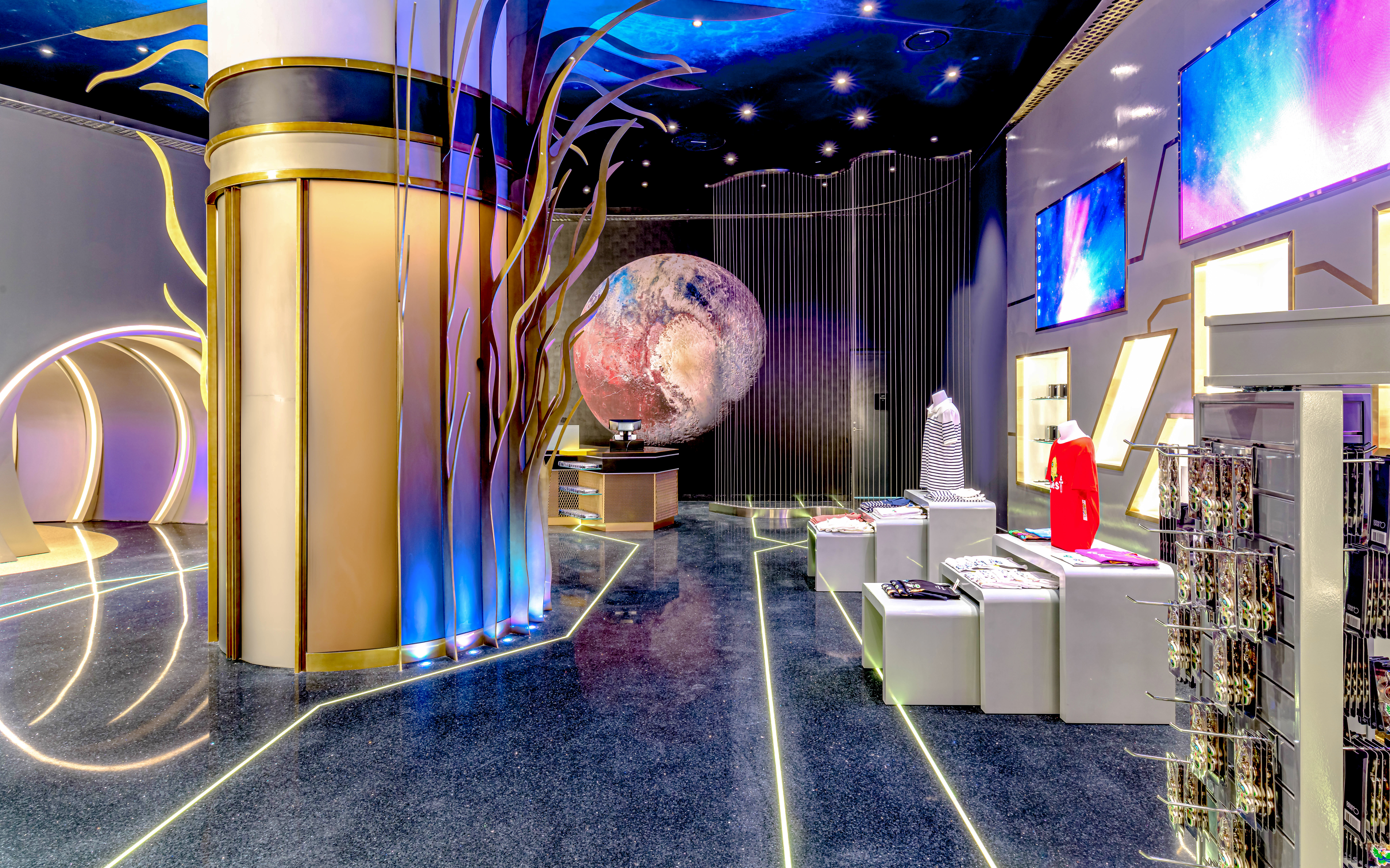 Shopping area with futuristic decor at Doha Quest, Qatar.