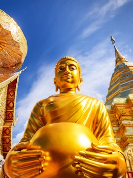 Golden Buddha statue at Wat Phra That Doi Suthep, Chiang Mai, Thailand.