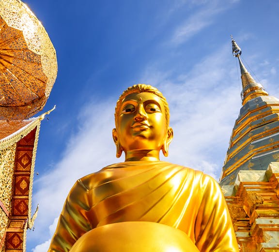 Golden Buddha statue at Wat Phra That Doi Suthep, Chiang Mai, Thailand.