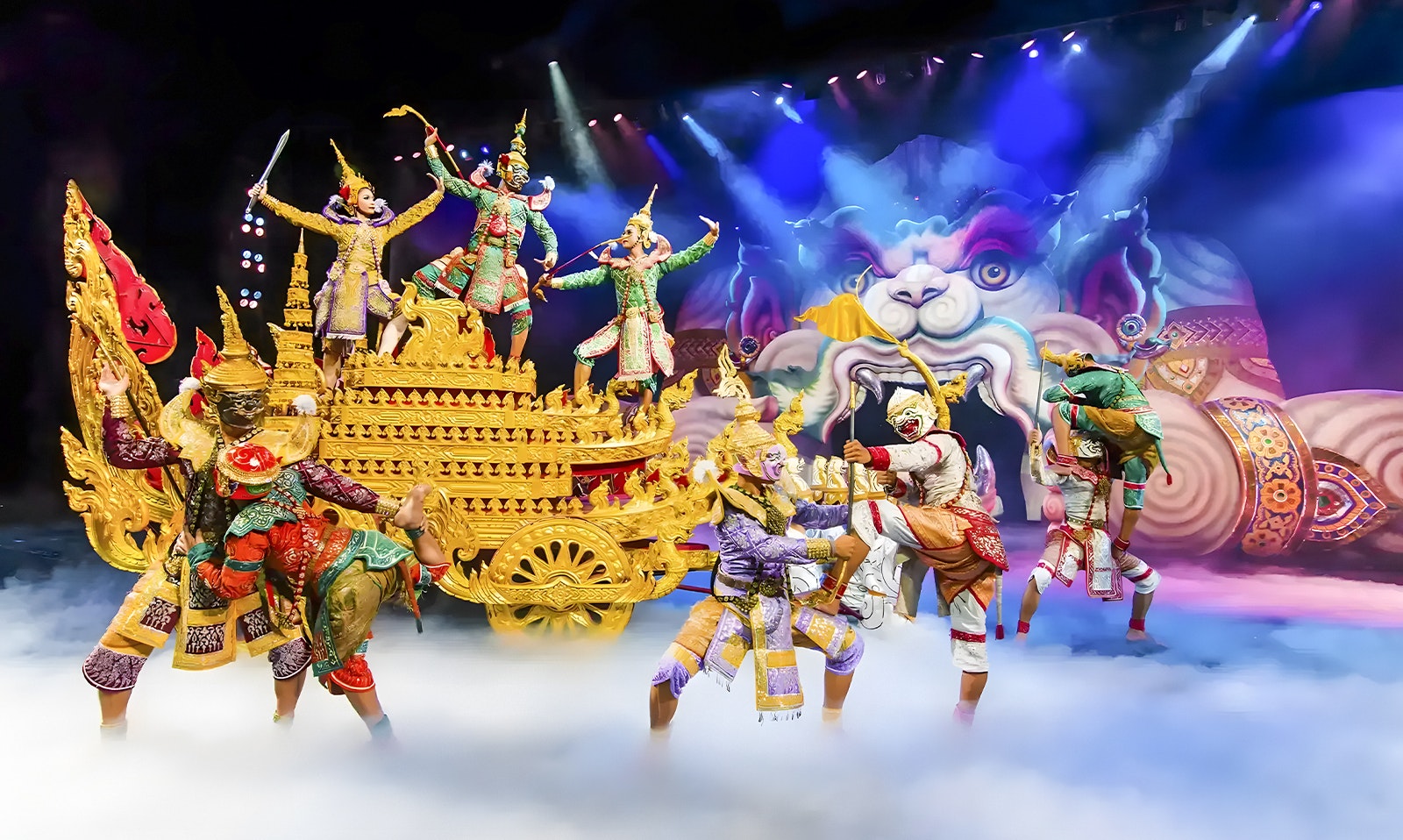 Vibrant performance at Phuket Fantasea with actors in elaborate traditional Thai costumes depicting a mythical scene