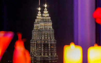Petronas Twin Towers view from ARAS restaurant, KL Tower, Kuala Lumpur at night.