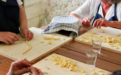 Making orecchiette pasta at Polignano a Mare cooking class.