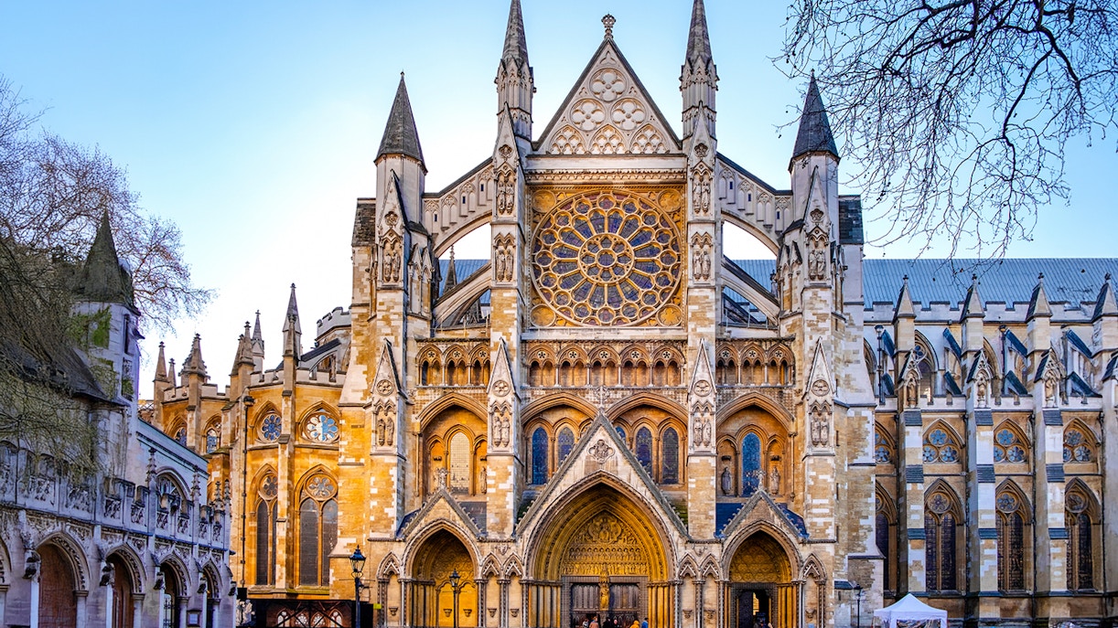 Northern entrance of Westminster Abbey with intricate Gothic architecture.